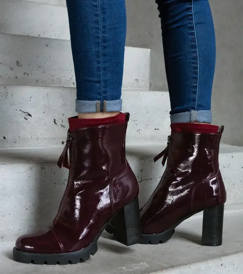Gemre Burgundy patent heeled ankle boots decorated with Tiri fastening