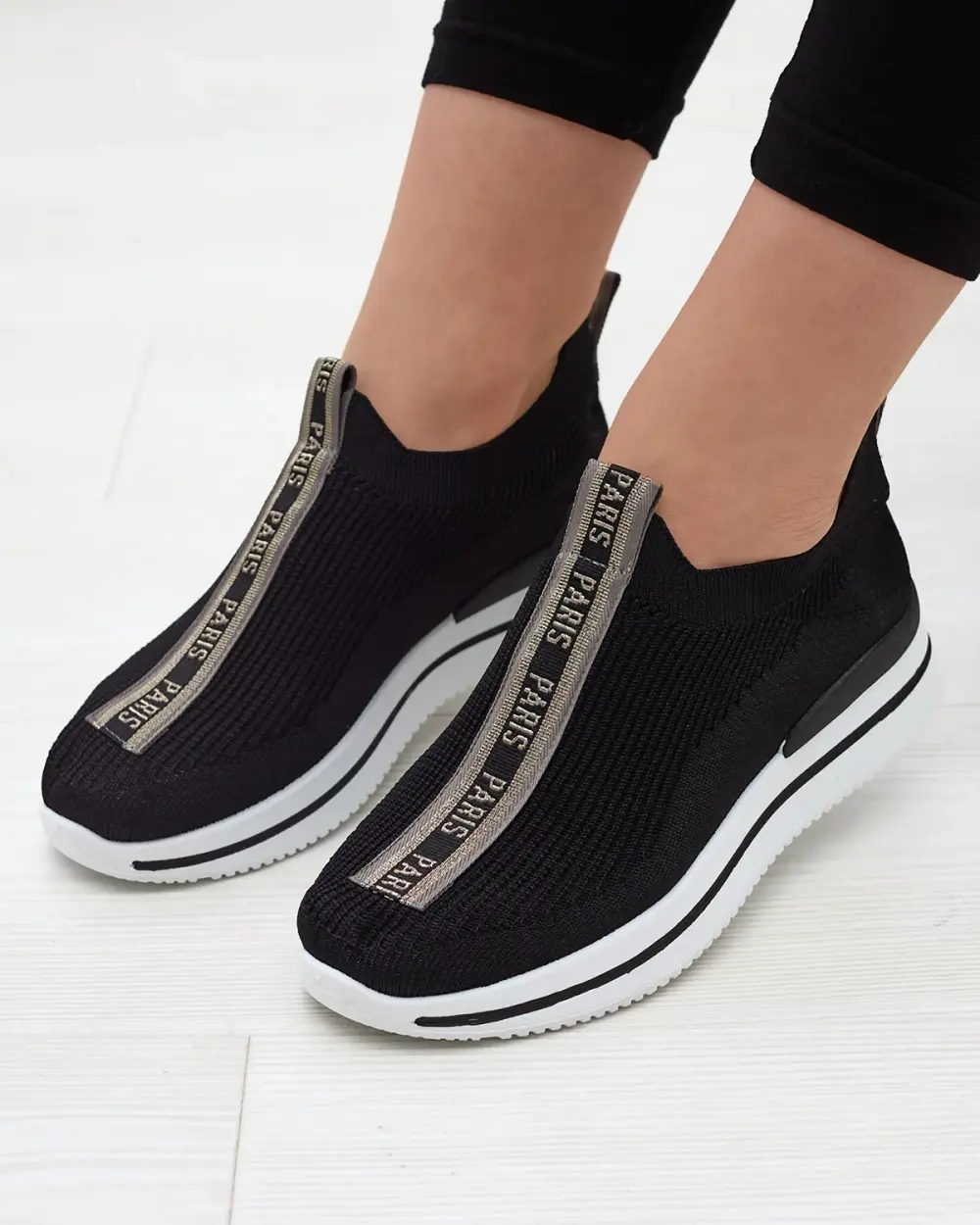 Resti Women's slip-on sports shoes with lettering in black Cerppa- Footwear