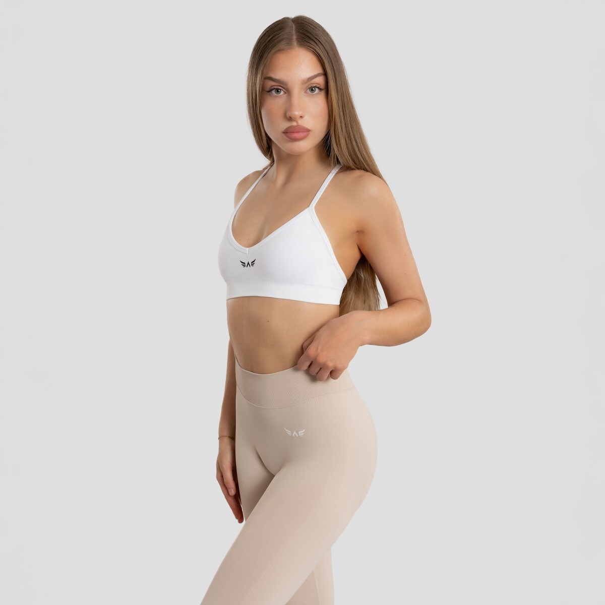 Dámská bezešvá sportovní podprsenka exalted impact shape 2.0 bílá xs