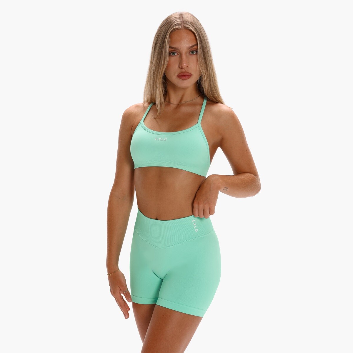 Dámská bezešvá sportovní podprsenka exalted impact elevate 2.0 tyrkysová xs