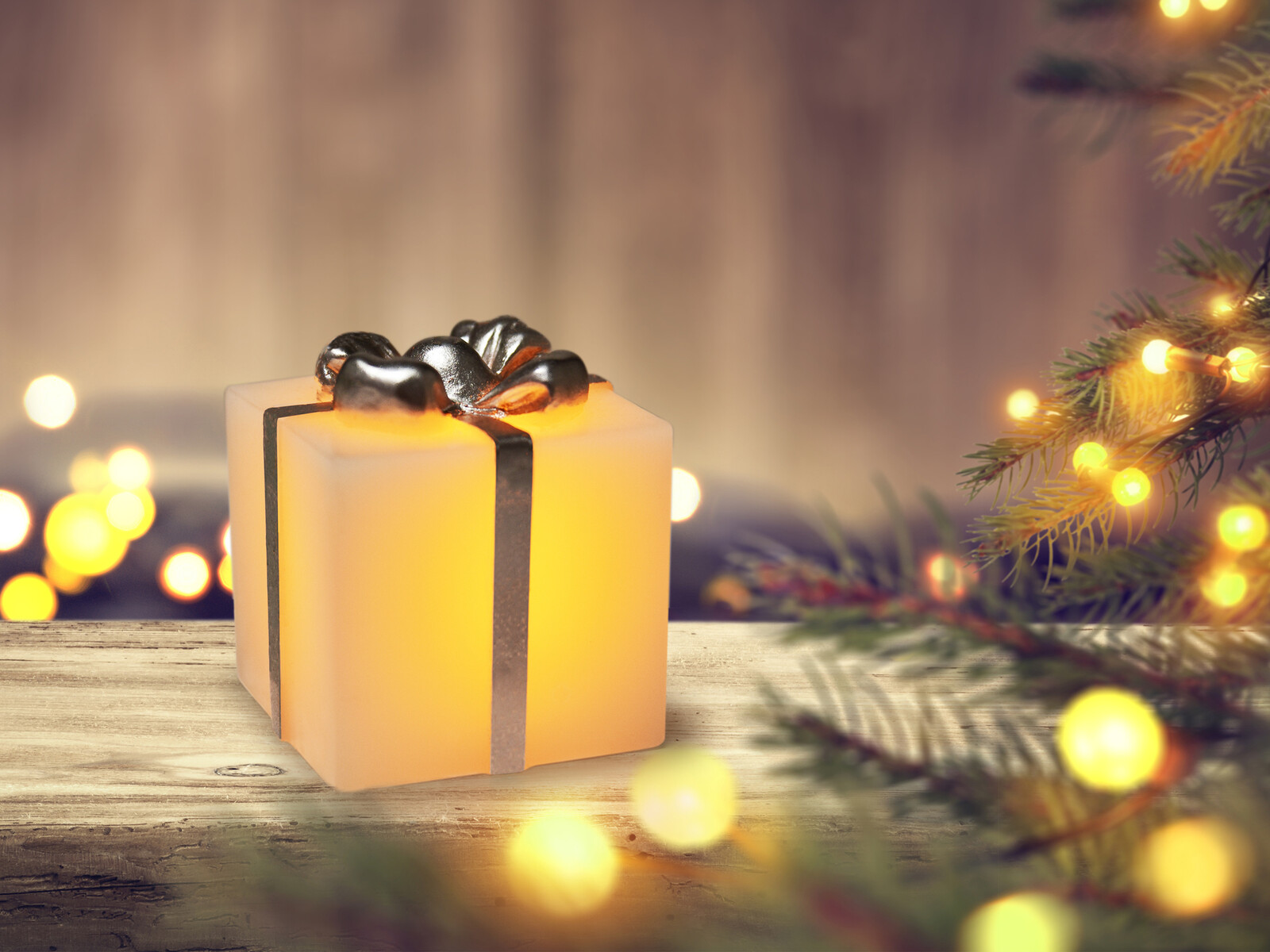 Svítící dárek s mašlí | LED vosková dekorace se stříbrným finišem | 9 cm