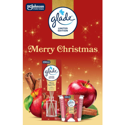 Glade Merry Christmas Warm Apple Pie jablko a skočice vonné tyčinky a vonná svíčka 50 ml + 112 g, dárková sada