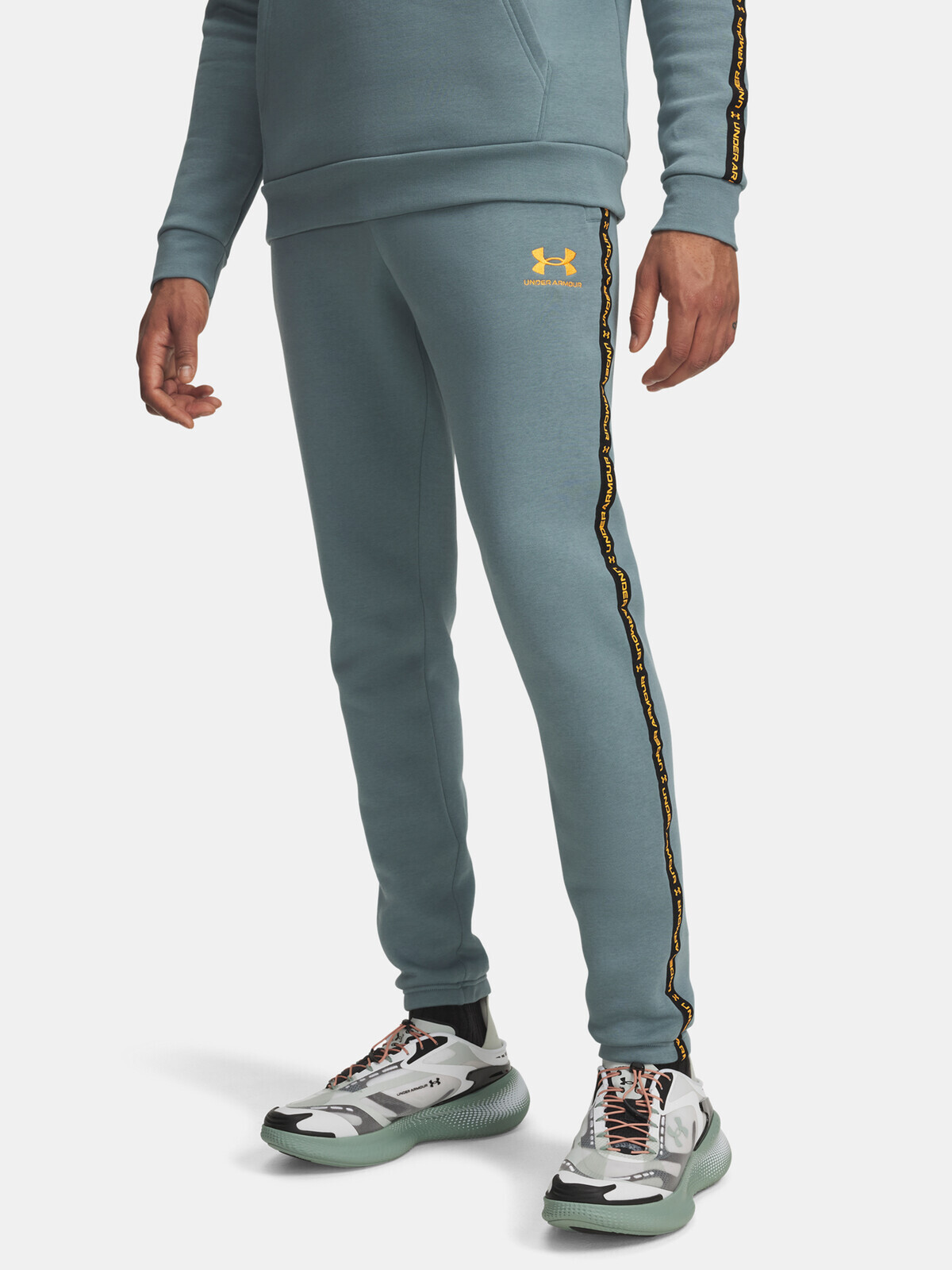 Pánské tepláky Under Armour UA Icon Fleece Jgr Taping-BLU - Pánské
