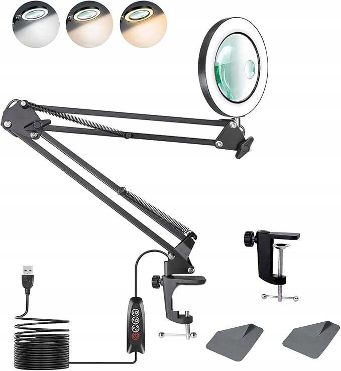 Lampa s lupou na výložníku s lupou připevněná k psacímu stolu