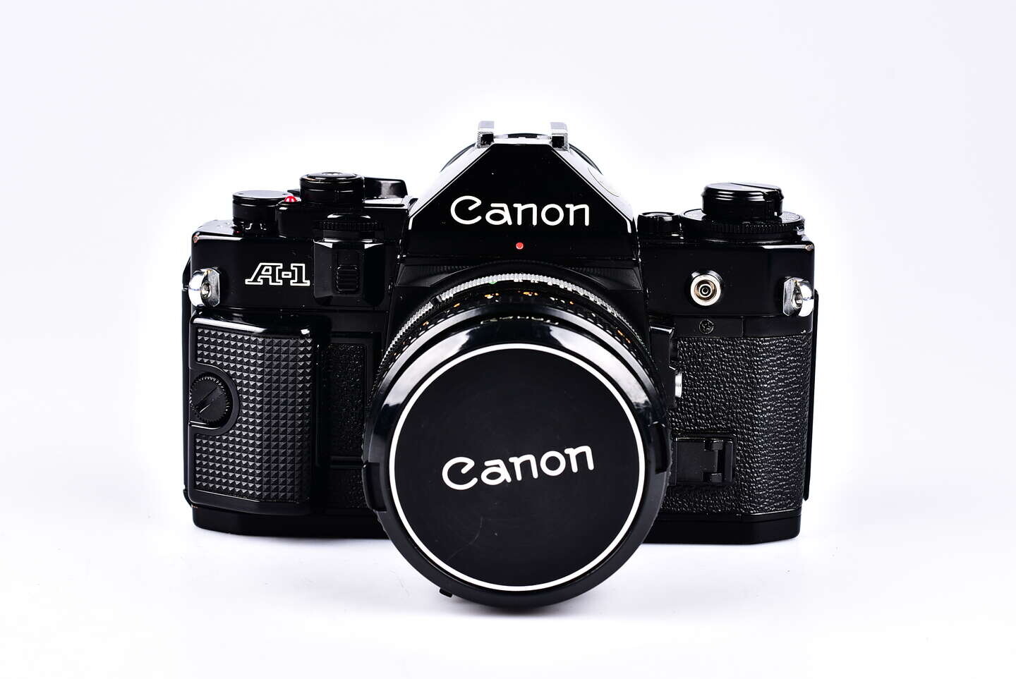 Canon A-1 + 50 mm f/1.8 bazar