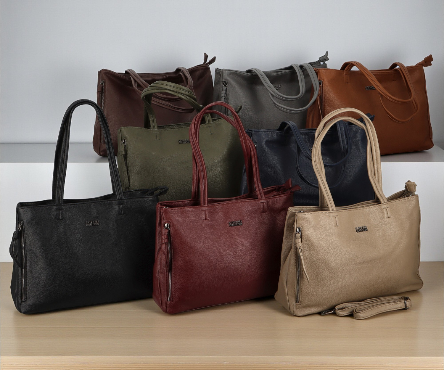 Módní dámská koženková kabelka na rameno Coveri Temari, tmavě modrá