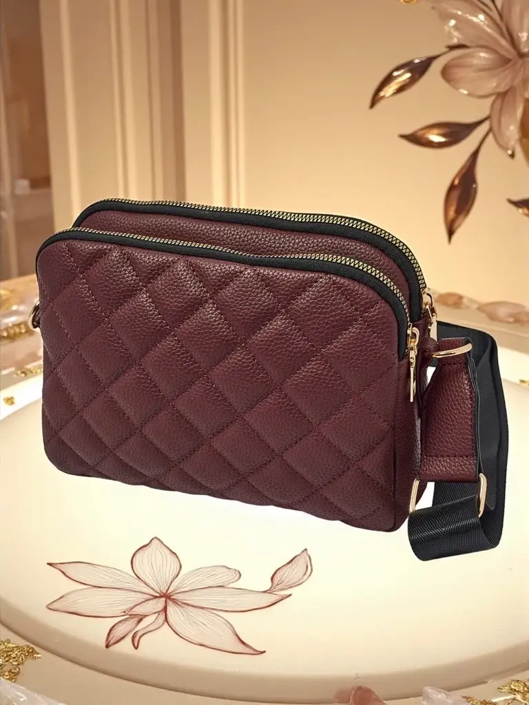 Resti Small quilted Copper Veil handbag made of soft eco-leather