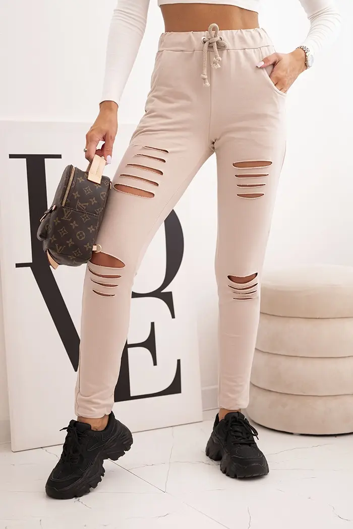 Kesi Dámské kalhoty z bavlny s roztržením a gumou v pase béžové