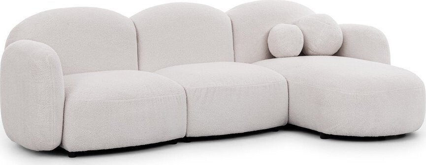 Krémová rohová pohovka z textilie bouclé (pravý roh/s lenoškou) Orbit – Ropez