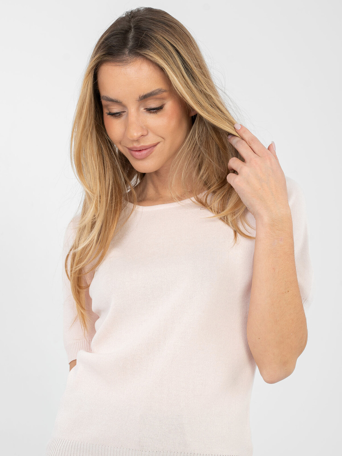 Světle růžový svetr