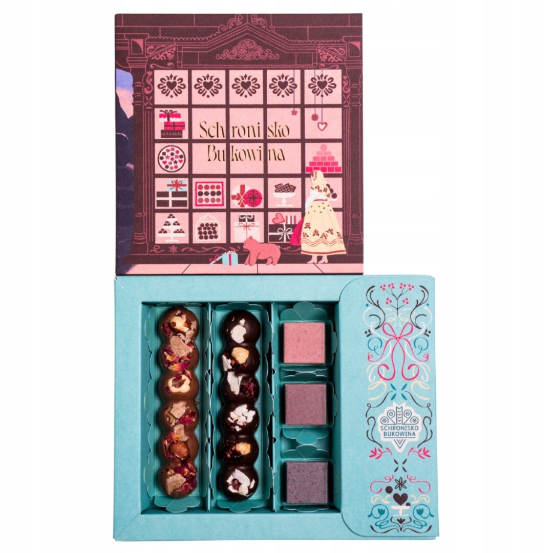 Tyčinky a pralinky z mléčné čokolády s ovocem a ořechy Útulek Bukovi