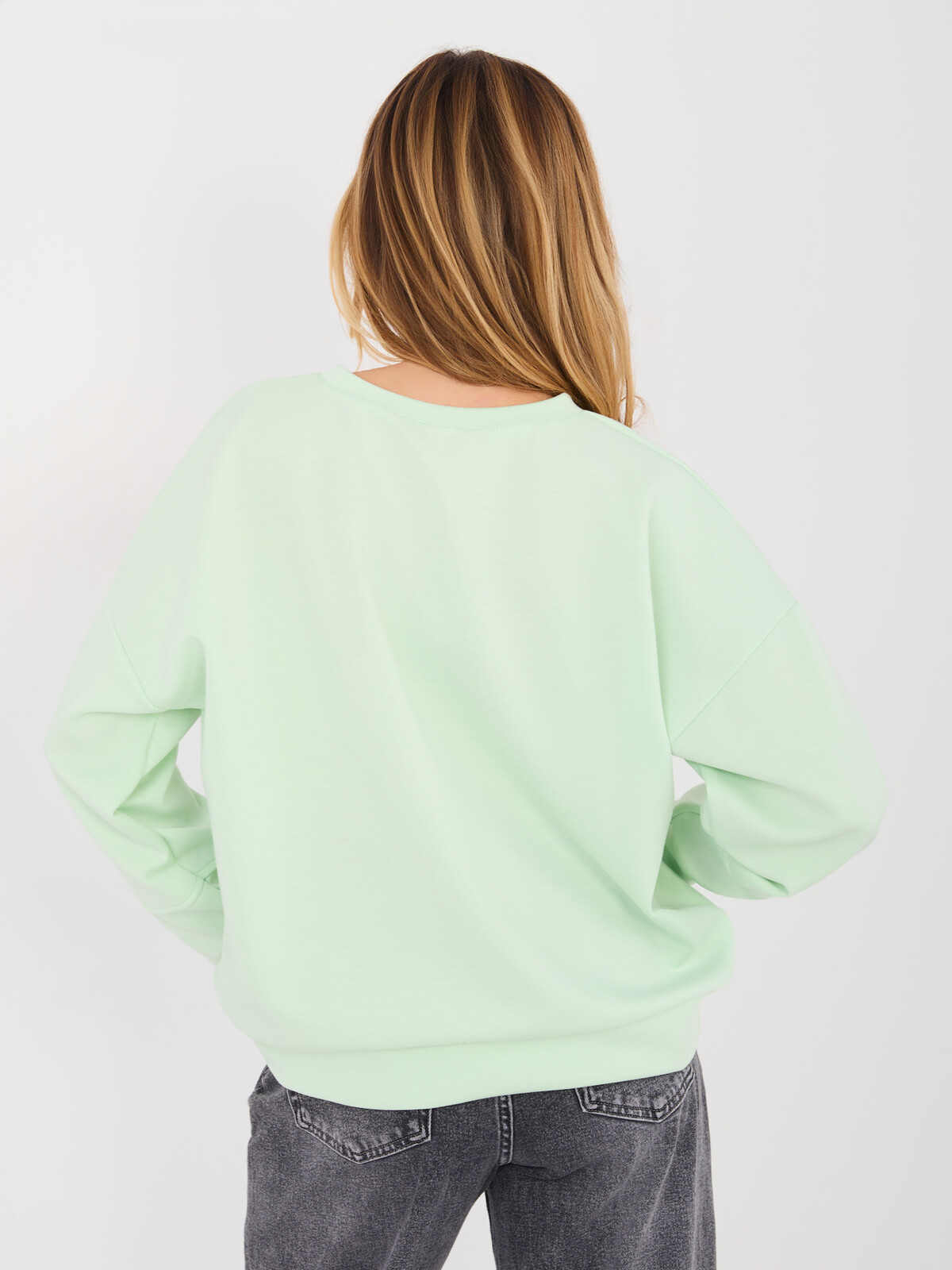 Světle zelená mikina s nápisem