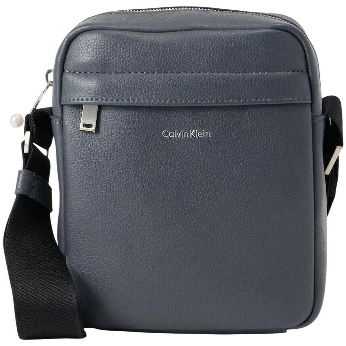 Calvin Klein Jeans  RAISED REPORTER LV04D3160G  Šedá