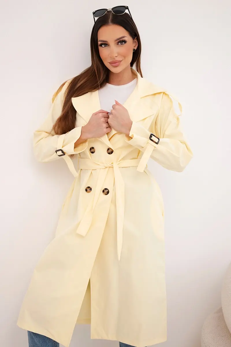 Žlutý dámský kabát s vázáním v pase