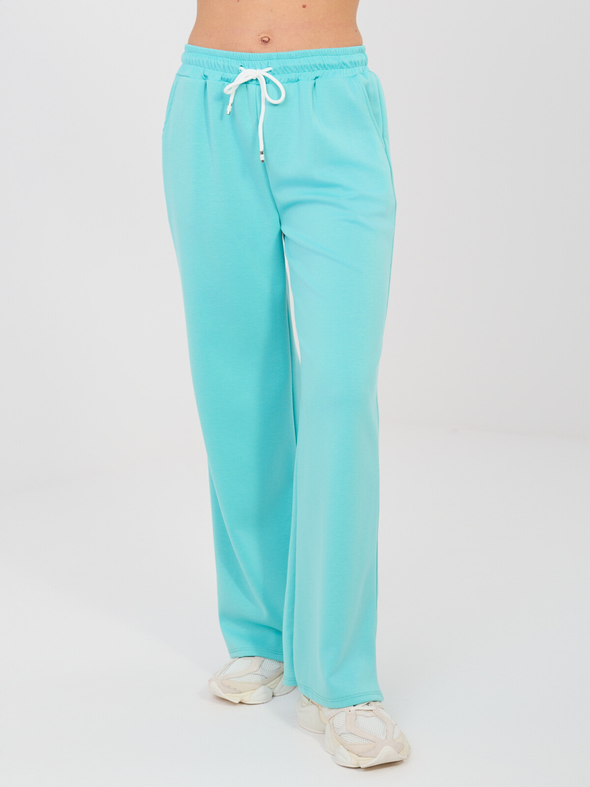 Tyrkysové tepláky s vázáním