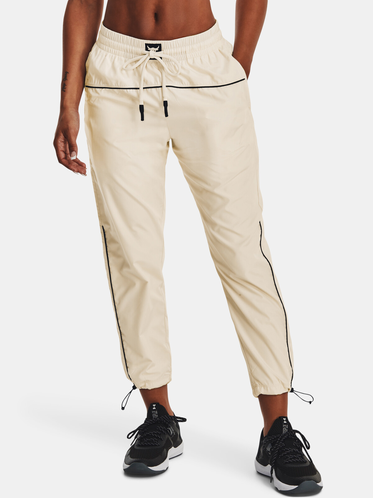Krémové dámské kalhoty Under Armour