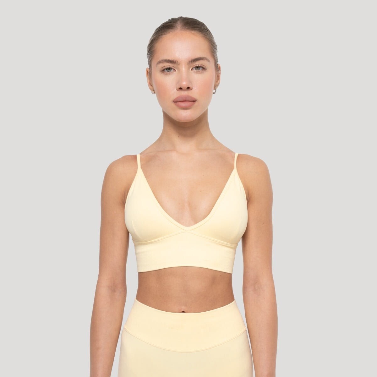 GymBeam Sportovní podprsenka Luma Butter Yellow