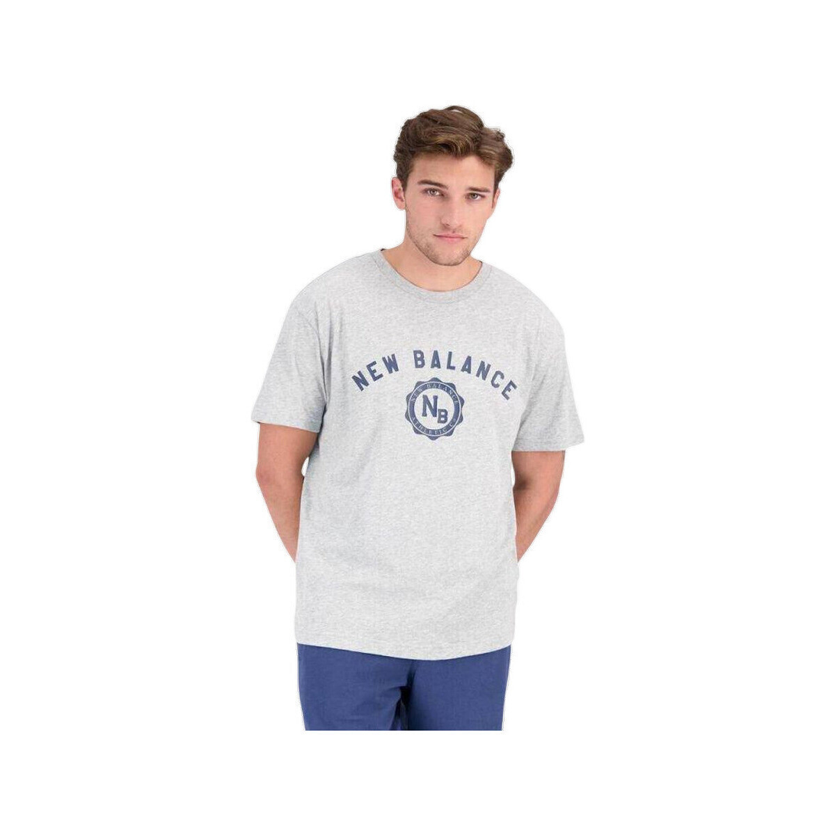 New Balance  T-shirt  Sport Seasonal Graphic Cot AG M 100% coton  Šedá