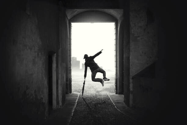 francescoch Plakát, Obraz - happy man jumping happy despite the bad weather, francescoch, 40 × 26.7 cm