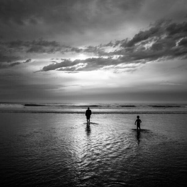 Cavan Images Plakát, Obraz - A father and son wade into, Cavan Images, 40 × 40 cm