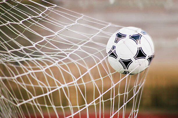 Cocoon Plakát, Obraz - Football Trapped in a Goal Net, Close-Up, Cocoon, 40 × 26.7 cm