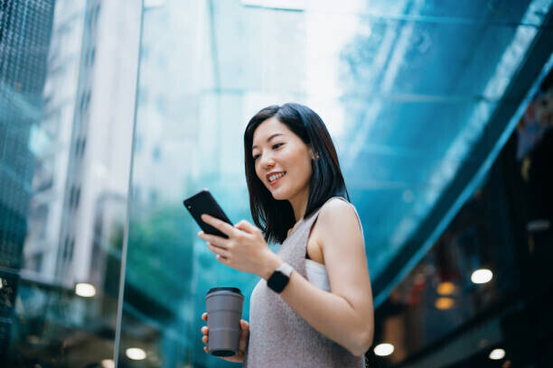 d3sign Plakát, Obraz - Successful young Asian businesswoman holding a, d3sign, 40 × 26.7 cm