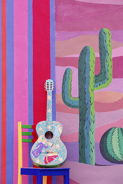 Grant Faint Plakát, Obraz - PAINTED GUITAR, CHAIR & WALL IN CANCUN, MEXICO, Grant Faint, 26.7 × 40 cm