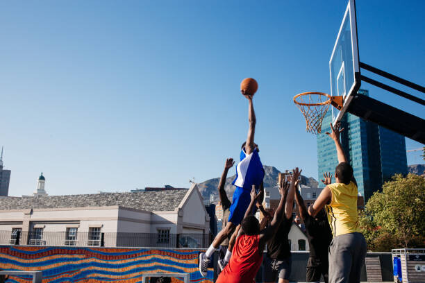 Hello Africa Plakát, Obraz - Tall player floating in to score a basket, Hello Africa, 40 × 26.7 cm