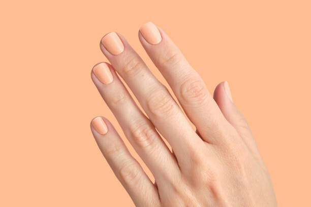 Mariya Borisova Plakát, Obraz - Manicure in the colors of the year Peach Fuzz., Mariya Borisova, 40 × 26.7 cm