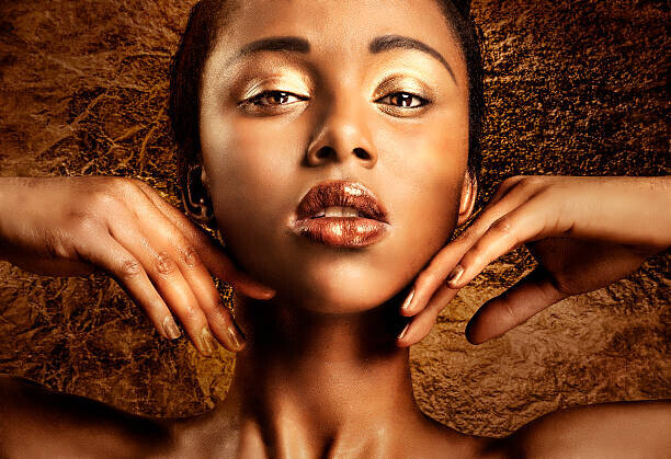 Paper Boat Creative Plakát, Obraz - Portrait of a woman with bronze and gold makeup, Paper Boat Creative, 40 × 26.7 cm