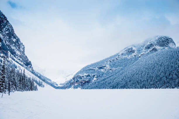 Jacobs Stock Photography Ltd Plakát, Obraz - Snowy mountains in remote landscape, Lake, Jacobs Stock Photography Ltd, 40 × 26.7 cm