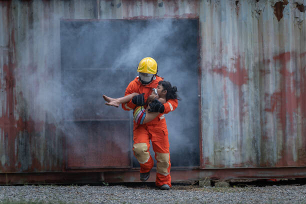 Vithun Khamsong Plakát, Obraz - Firefighter professionally rescue the victim on, Vithun Khamsong, 40 × 26.7 cm