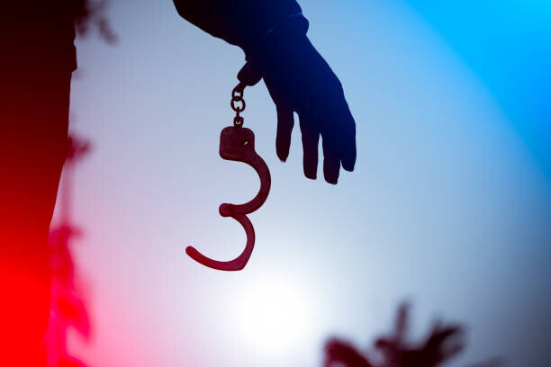 Chanin Nont Plakát, Obraz - A prisoner behind bars with hands cuffed, Chanin Nont, 40 × 26.7 cm