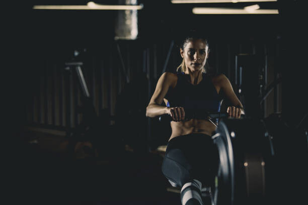 fotostorm Plakát, Obraz - Strong woman doing seated row exercise, fotostorm, 40 × 26.7 cm