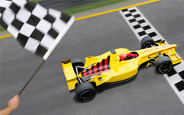 David Madison Plakát, Obraz - Checkered Flag Waving as Racecar Crosses, David Madison, 40 × 26.7 cm