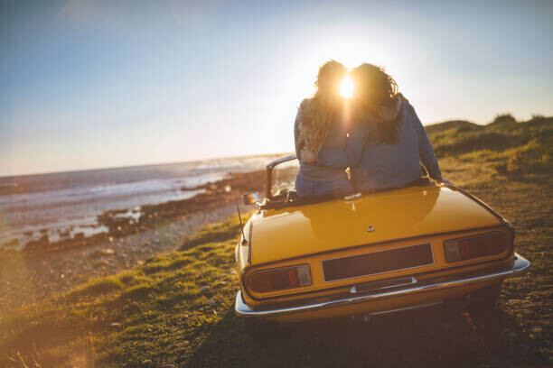 wundervisuals Plakát, Obraz - Women with convertible car relaxing at, wundervisuals, 40 × 26.7 cm