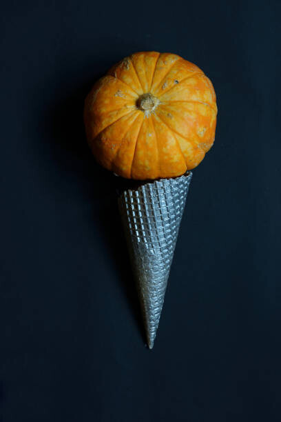 Elena Peremet Plakát, Obraz - Cream cone with pumpkin. Halloween concept, Elena Peremet, 26.7 × 40 cm