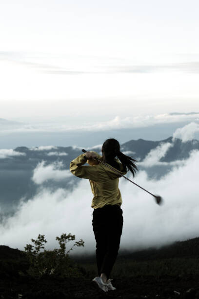 RunPhoto Plakát, Obraz - Young woman swing golf on mt.fuji, RunPhoto, 26.7 × 40 cm