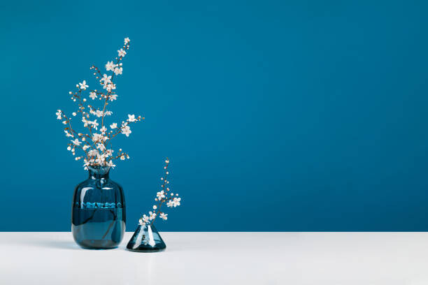 Aleksandra Konoplia Plakát, Obraz - Blue glass vases with bouquet of, Aleksandra Konoplia, 40 × 26.7 cm