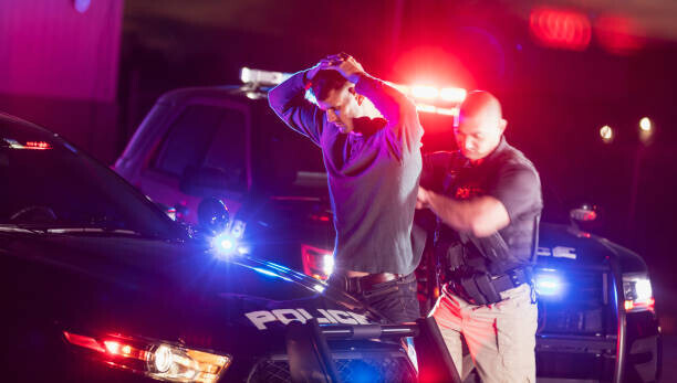 kali9 Plakát, Obraz - Police officer making an arrest, kali9, 40 × 22.2 cm