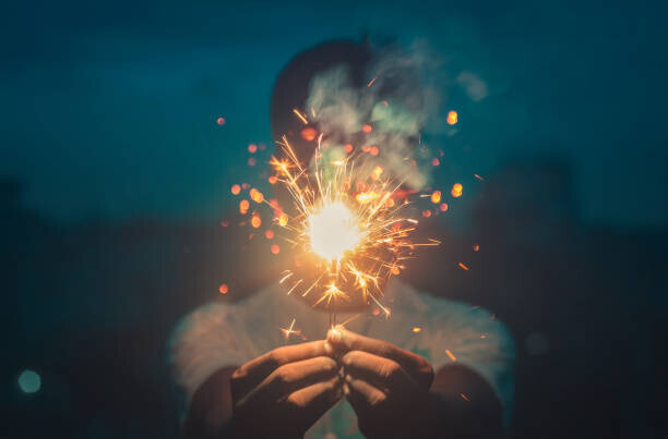 Nadia / 500px Plakát, Obraz - Cropped hands holding sparkler at night,Bangladesh, Nadia / 500px, 40 × 26.7 cm
