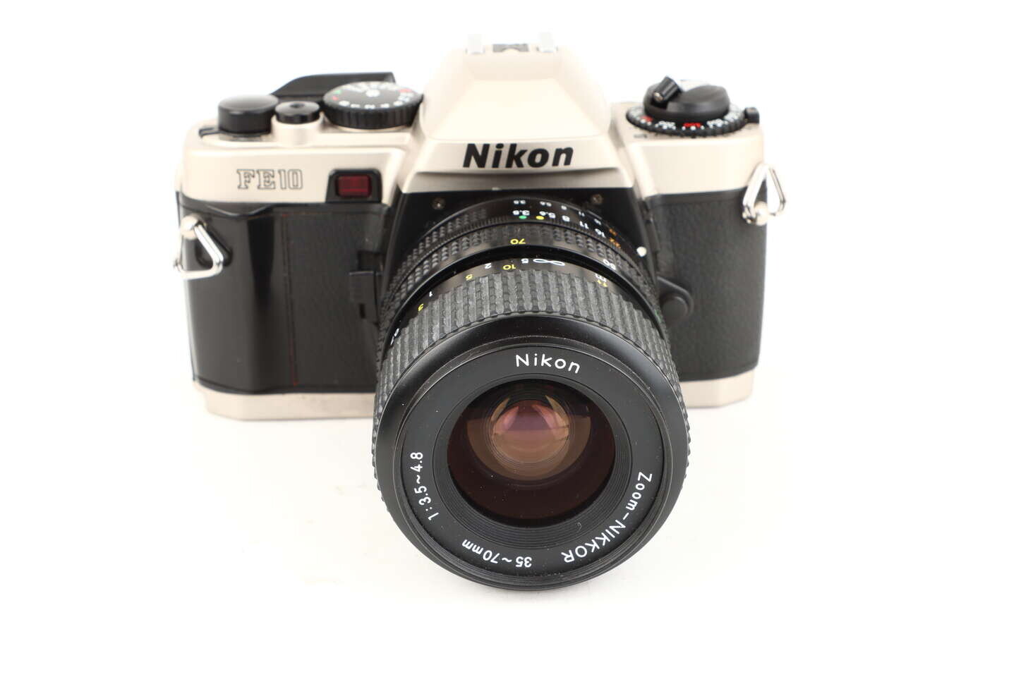 Nikon FE10 + 35-70 mm bazar