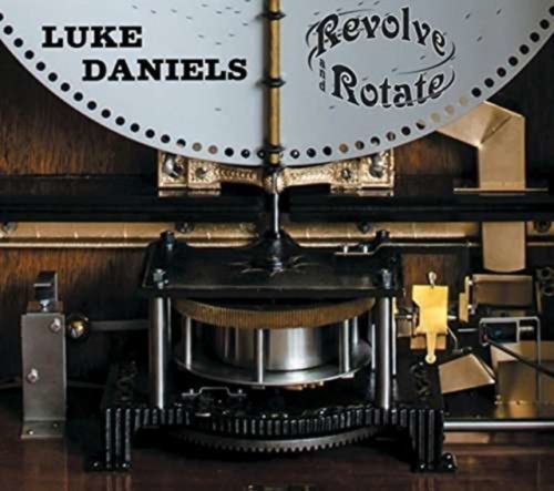 Revolve & Rotate the Polyphon Chronicles (Luke Daniels) (CD / Album)