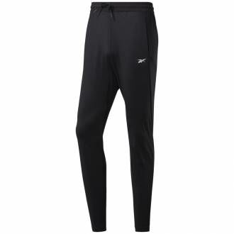 Reebok  tepláky WOR KNIT PANT -  FJ4057