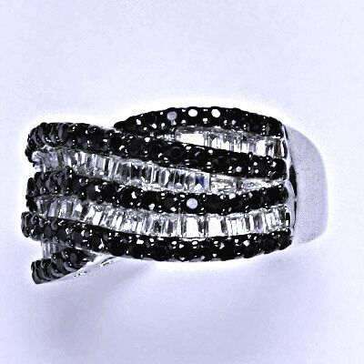 ČIŠTÍN s.r.o Stříbrný prsten se syntetickými čirými a černými zirkony, váha 9,37 g 14660